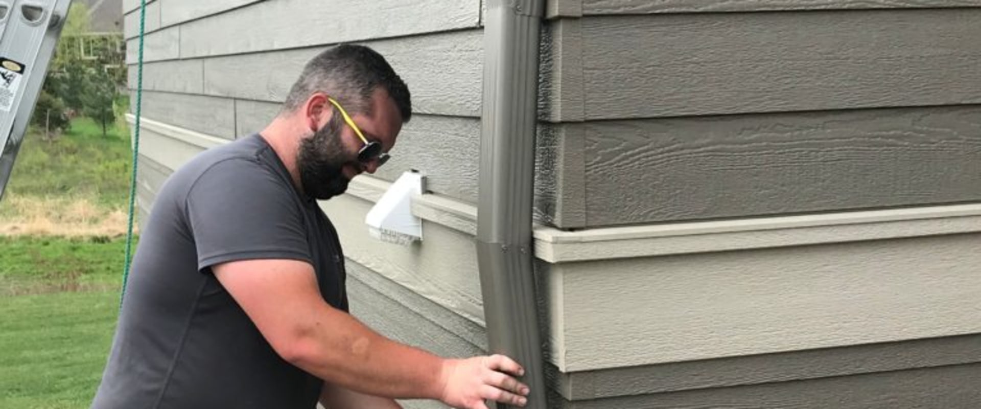 How long can a gutter run be with one downspout?